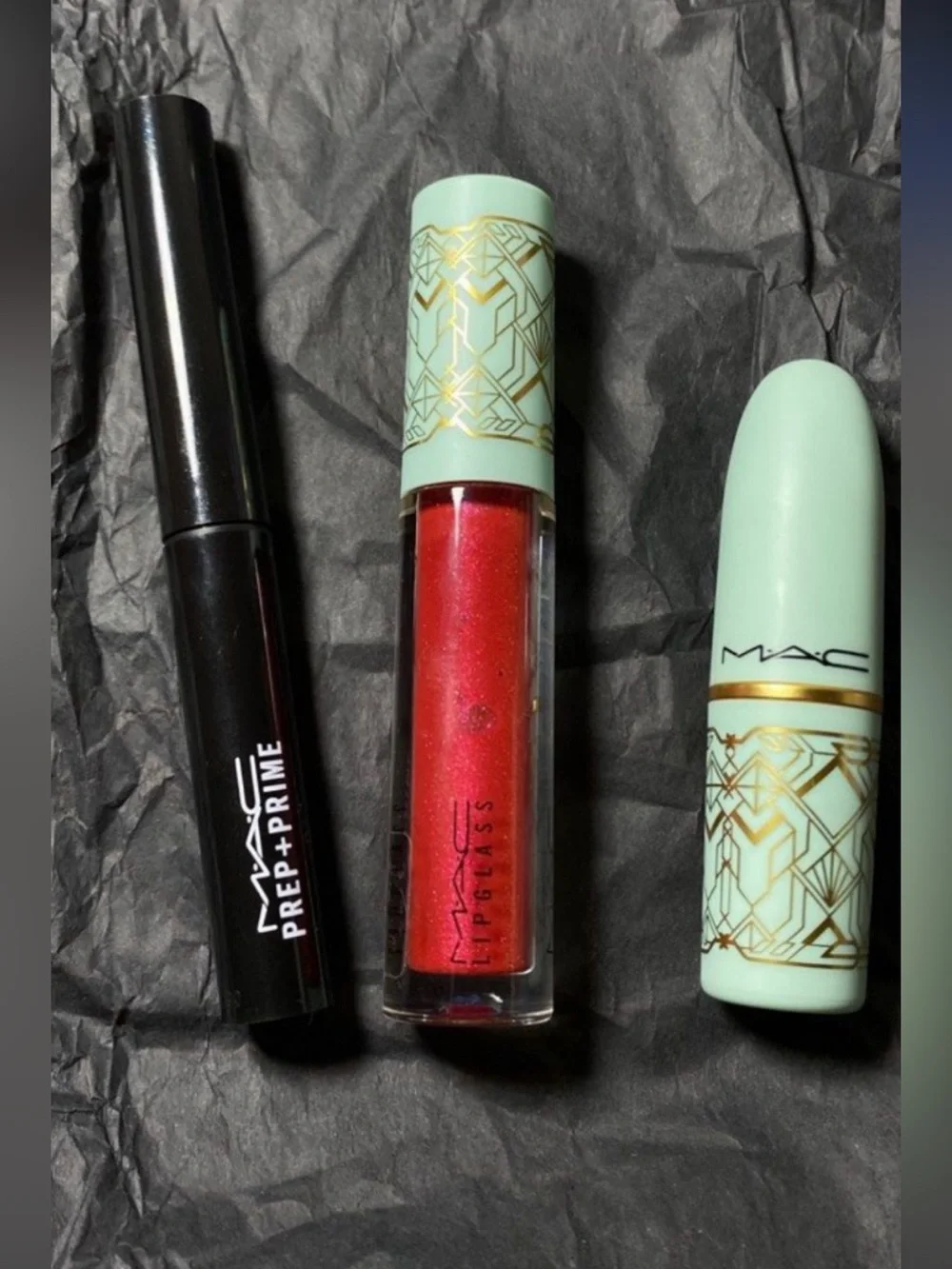 MAC Cosmetics Red Shimmer Lip Gloss in Mint-Gold Tube